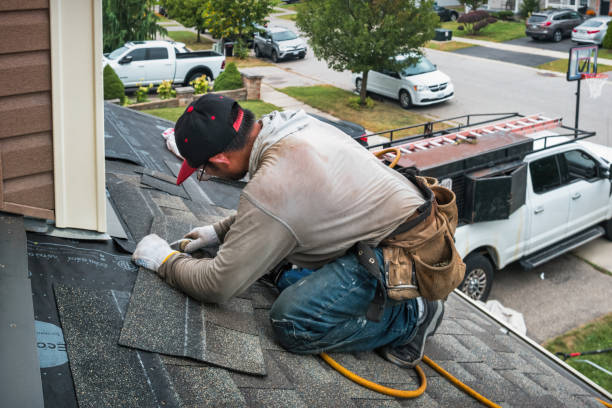 Professional Roofing technician working in Marshfield Hills, MA
